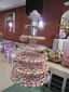 Cupcakes y pastel para XV años en fucsia y morado